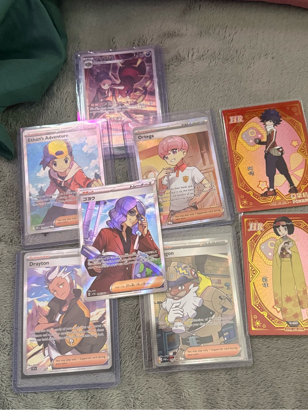 Pokemon Trainer Card Lot with Purple, Orange, Pink and Red Accents